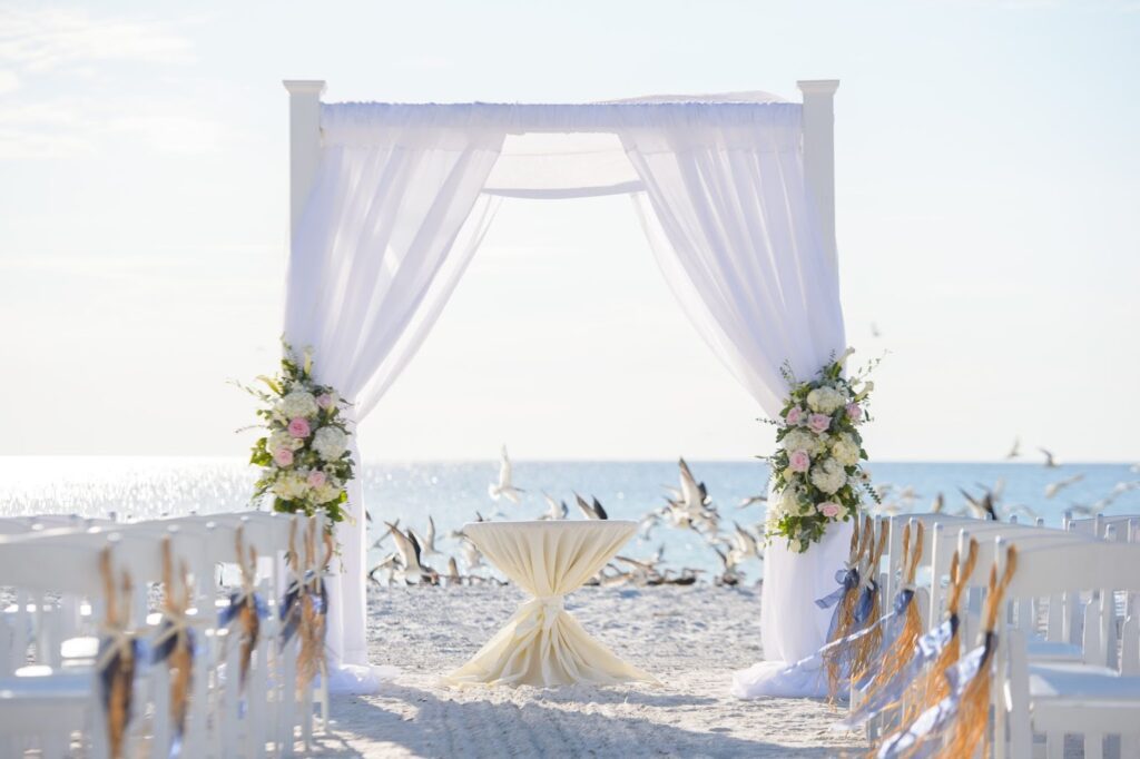Couple exchanging vows at a destination wedding venue in Florida on the beach